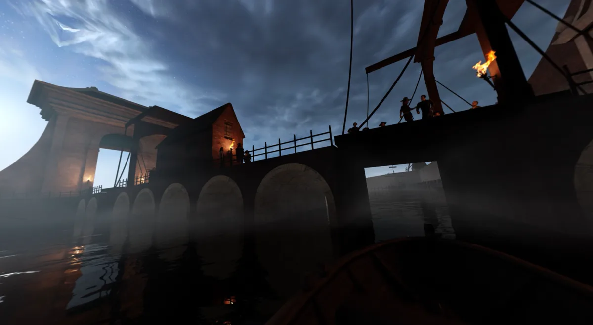 A nighttime scene from VRVoyage passing beneath a torch-lit gate