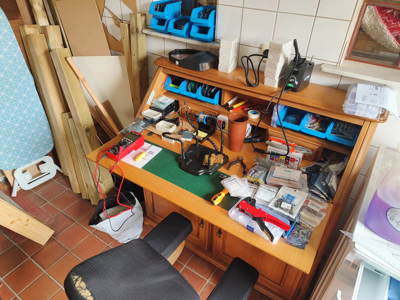The Skeleton Key workbench, mid-build — tools, electronics, and parts bins, clearly still a work in progress